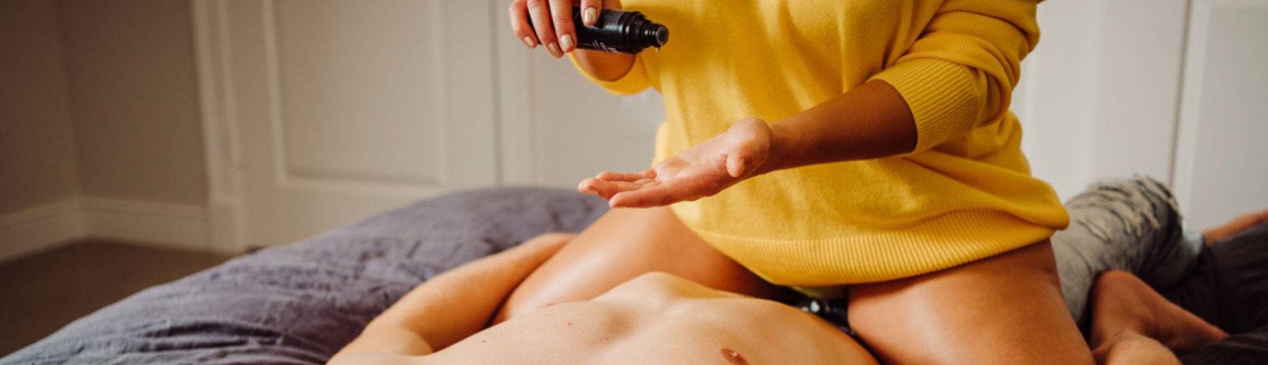 Couple using lubricant for a smooth, relaxing massage