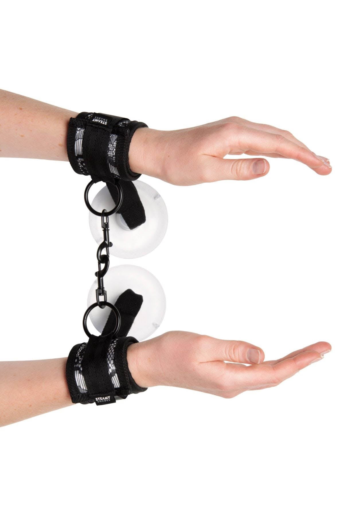 Steamy Shades suction cuffs for restraint on smooth bathroom or kitchen surfaces